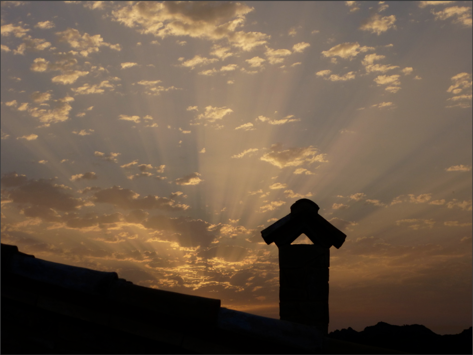 sunset over the house